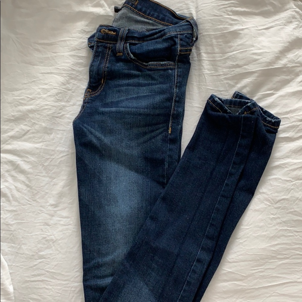 Buckle skinny jeans